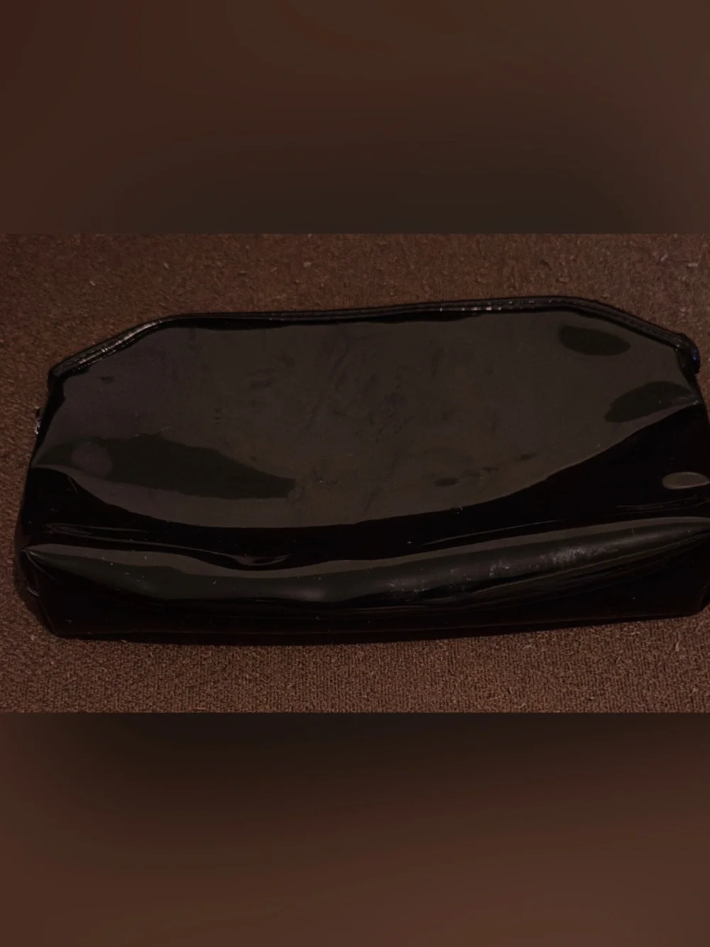 Dior Black Patent Leather makeup bag. 9”W x 5”H. Good condition.
